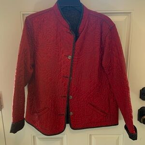 Reverse-able Chicos quilted jean jacket. Black jean and red. Size 2.